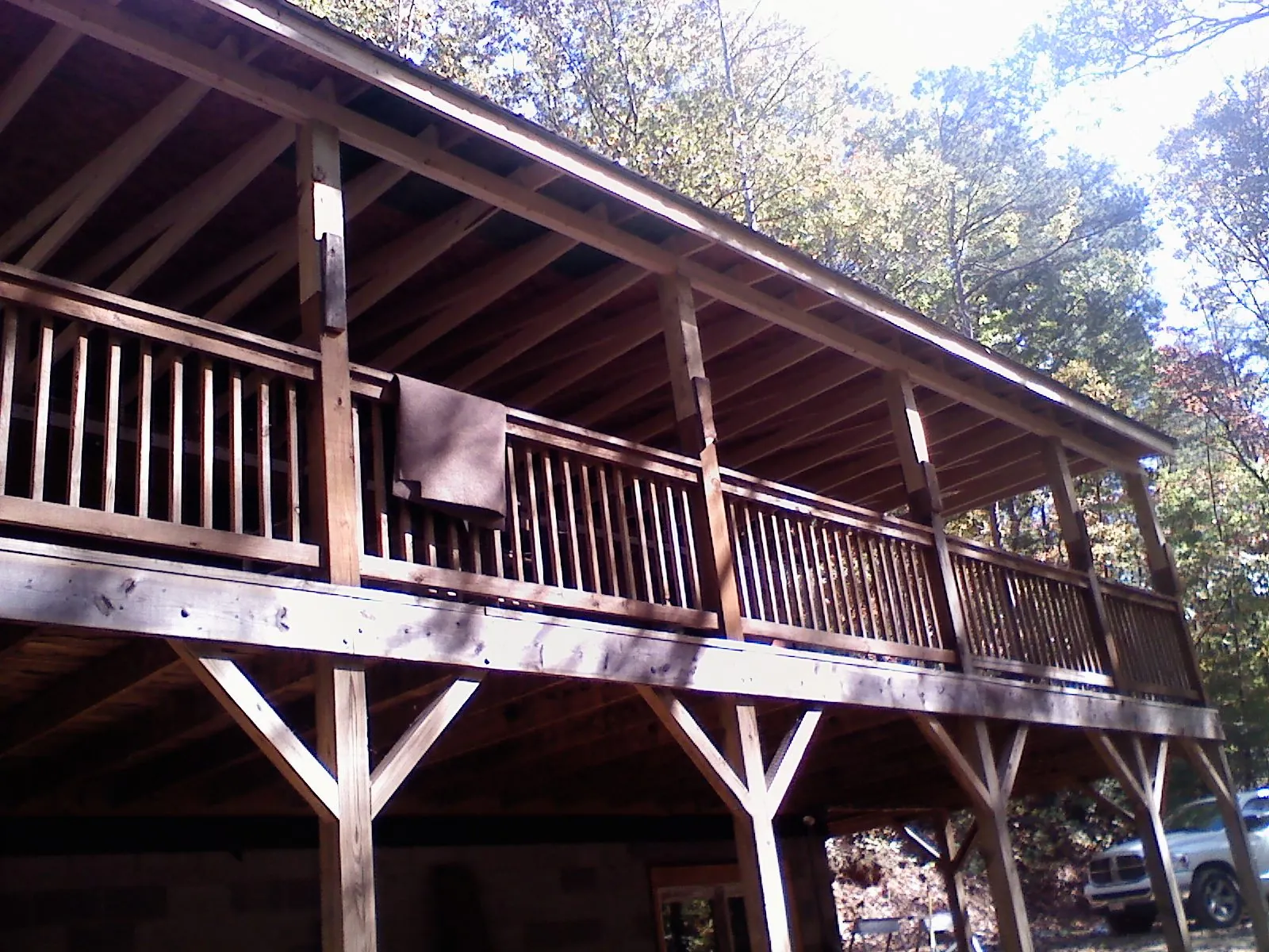 Timber framing under a new elevated porch and deck — Roof Leak Repair in Croton by Roofing Brothers